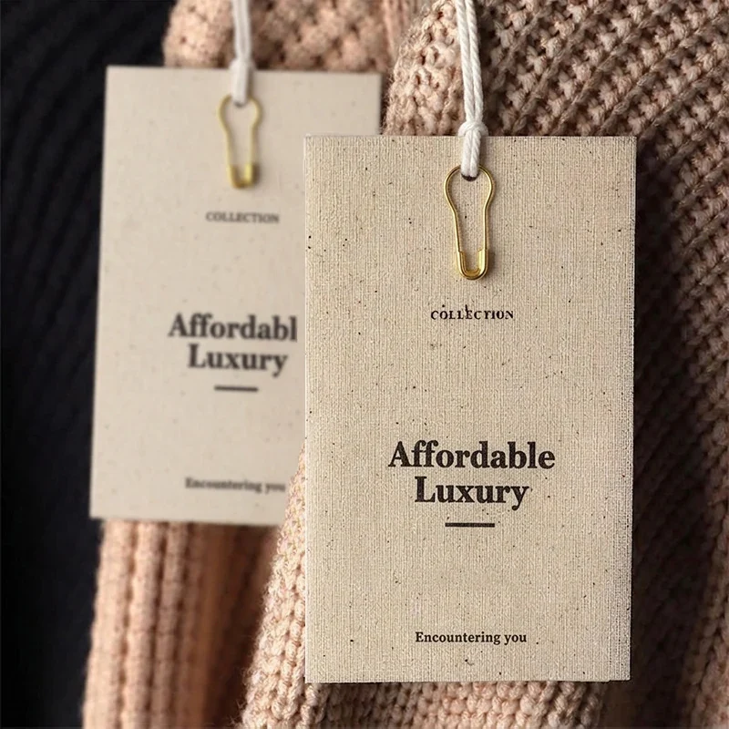 Apparel hang tags and strings