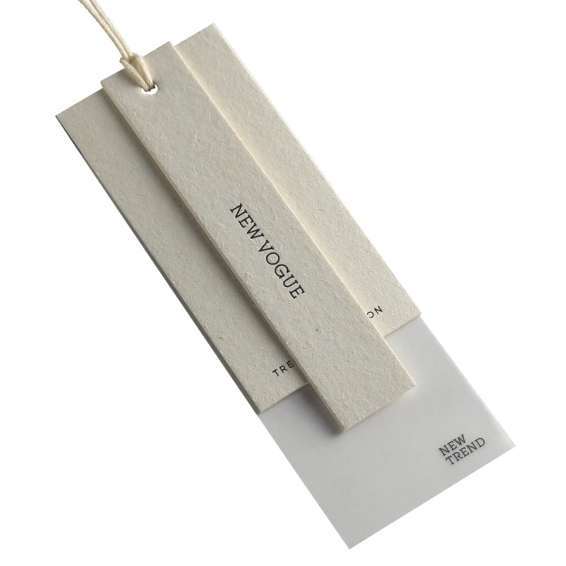Layered fashion hang tag style references with string attachments